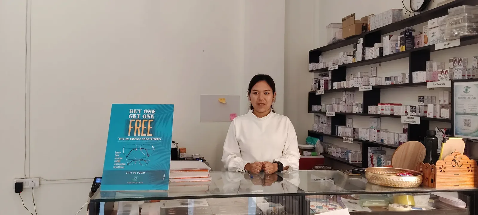 In-house pharmacy counter stocked with eye medication at Ibotombi Eye Care
